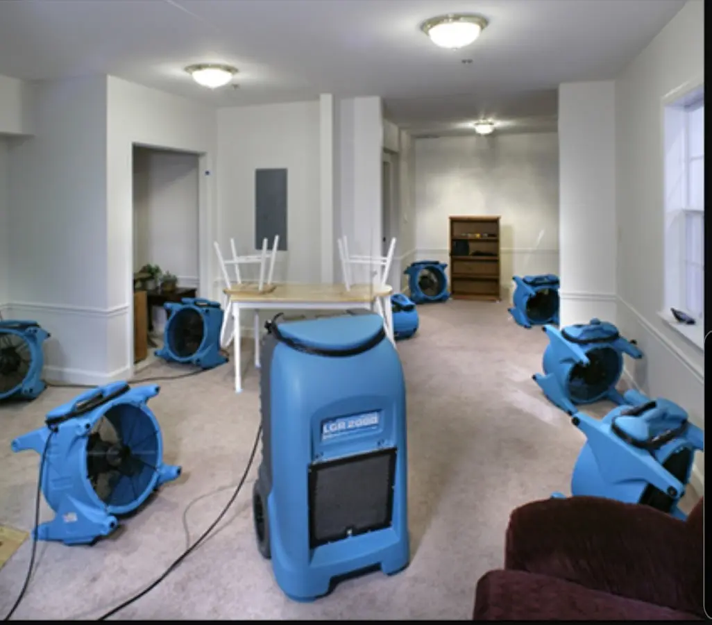Air movers and dehumidifier setup for Water Damage Restoration in Jerome